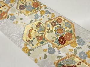 唐織亀甲に花々・蝶模様織出し袋帯